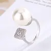 Anillo ajustable con incrustaciones de perlas de moda europea y americana chapado en cobre y platino, joyería nueva de 2024, para mujer, 14 mm, venta al por mayor