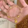 Novo Pulseira Amarela Chinesa com Contas Atrai Riqueza Absorve Ouro Pulseira Empilhável Joia de Mão Versátil de Alta Qualidade para Mulheres