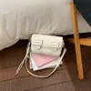 Bolso de mujer de gran capacidad transfronterizo, nuevo modelo primavera 2026, bolso de hombro para debajo del brazo, juego madre-hija, bolso pequeño cuadrado para trabajo y uso diario de mujer