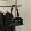 Bolso de Hombro Nuevo Estilo Primavera y Verano 2026 Nicho Retro Elegante Bolso de Concha para Mujer Moderno Simple Bolso Cruzado de Axila