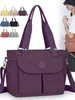 Bolso de mujer tendencia transfronteriza, bolso de hombro para mamá, nuevo modelo 2026, tela de nailon ligera, bolso de tela de color liso, bolso de mano cruzado