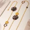 Rueda de la fortuna acero inoxidable acrílico estampado de leopardo disco collar de suéter estilo europeo y americano nuevos accesorios de moda una generación de pelo