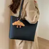 Bolso Tote Sencillo de Gran Capacidad para Viajes Diarios para Mujer 2025 Invierno Nuevo Estilo Lujo Accesible Color Contrastante Estilo Extranjero Exquisito Bolso de Hombro Único