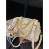 Bolso de cadena transfronterizo de nicho con patrón de diamante para mujer, nuevo bolso de mano versátil versión coreana para la primavera de 2026, bolso de hombro y cruzado