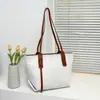 Bolso de mano casual simple de estilo europeo y americano, bolso tote grande de gran capacidad para el día a día, bolso de hombro y para llevar debajo del brazo para mujer