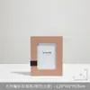 Mesita de noche de modelo de habitación minimalista de lujo ligero, Marco de fotos, Armario, Mueble de TV, Artículos de decoración para el hogar, Mesa de centro