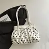 Bolso de mano fresco y delicado de lunares con un lazo, nuevo diseño de moda nicho para mujer 2026, bolso de hombro para ir al trabajo, bolso de axila
