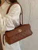 2026 nova moda transfronteiriça bolsa tipo travesseiro simples bolsa de ombro casual coreana para mulheres bolsa de mão com textura de luxo leve