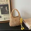 2026 Nuevo Bolso de Mano de Malla Hueca Estilo Coreano Bolso de Muñeca Tejido Bolso de Mano de Moda para Vacaciones en la Playa