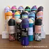 Bestseller transfronterizo, vaso Owala de aspecto elegante con pajilla, botella de agua deportiva portátil de acero inoxidable de gran capacidad con doble boquilla y asa