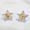 Brincos de Estrela de Cinco Pontas Europeus e Americanos Simples e Versáteis Transfronteiriços Aço de Titânio Moda Feminina Design de Nicho Brincos de Aço Inoxidável Joias