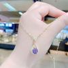 Pendientes elegantes y personalizados con microincrustaciones de cristal morado, con forma de gota de agua, a la moda, con hebilla para la oreja, largos y ligeros, de lujo, para mujer.