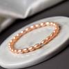 Pulsera de perlas al por mayor para mujer, pulsera de perlas naturales de agua dulce, cuentas de mijo, pulsera de cuerda elástica, nicho simple de lujo ligero
