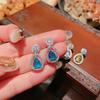 Aretes colgantes geométricos de gema azul Topa brillante, chapados en oro de 18 quilates, diseñador, circonita púrpura Tan sang, aretes huecos