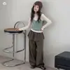 Conjunto de otoño para niña 2026 nuevo estilo: top de punto tipo camisola con falda acampanada y pantalones de pierna ancha, conjunto infantil en capas estilo coreano