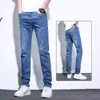 Calça Jeans Masculina Fina 2026 Primavera Nova Tendência Esticável Lavada Slim Fit Perna Afunilada Azul Calça Longa Masculina