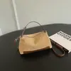 Bolso de mano único y discreto de lujo para mujer, nuevo modelo 2026, lindo y versátil, bolso de hombro y cruzado vintage de otoño para el trabajo
