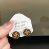 Pendientes rojos para el Año Nuevo Chino pendientes colgantes de nudo trenzado con esmalte S925 aguja de plata pendientes elegantes de otoño e invierno de lujo ligero