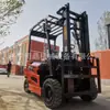 Carretilla Elevadora Eléctrica de Nueva Energía 2 Toneladas Sentado Batería de Litio Camión Pequeño de Transporte 1 Tonelada 3 Toneladas Apilador Carretilla Elevadora Eléctrica de Cuatro Ruedas