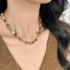 Novo Colar de Pérolas Outono e Inverno Feminino Nicho de Luxo Leve Maillard Olho de Tigre Contas Colar Elegante Decoração de Corrente de Lã
