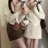 Treze saia de veludo cotelê outono e inverno estilo retrô, suave e elegante, com pequenos enfeites florais, forro de shorts de segurança e uma saia curta ou meia-saia com zíper