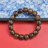 Cuero de tigre sándalo cuentas antiguas hombres y mujeres pulsera de mano cuentas de texto rosario sándalo joyería popular joyería de madera alrededor del dedo suave