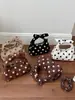 Bolso de mano de lunares de nicho estilo coreano transfronterizo para mujer, nuevo 2026 súper popular, bolso versátil de moda para hombro y cruzado