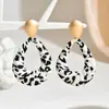 Pendientes geométricos de leopardo de moda europea y americana Pendientes vintage Maillard Pendientes de temperamento de moda Sentido de lujo ligero de alta gama