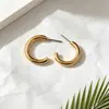Nuevos pendientes de estilo minimalista europeo y americano, chapados en oro brillante, diseño abierto en forma de C, pendientes de aro de nicho y versátiles