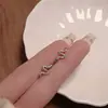 Nuevo mini pequeño serpiente de espíritu clavo de oreja hebilla de tornillo clavo de hueso de oreja accesorios para orejas diseño de nicho pendientes diamante verde lujo ligero venta al por mayor