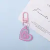 Llavero brillante en forma de corazón, colorido y reluciente, colgante de resina de alta estética, alegra el estado de ánimo, un regalo considerado para niñas