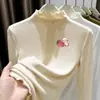 Camiseta de manga larga de terciopelo alemán con cuello alto y ribete de oreja de madera para niñas 2026 Otoño/Invierno prenda interior capa base top cálido cepillado