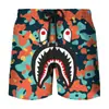 Pantalones cortos de verano transfronterizos nuevos con estampado digital 3D de cabeza de tiburón, para pareja, hombres y mujeres, marca de moda japonesa, pantalones de playa