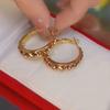 Aretes de anillo de diamantes de alta gama de lujo ligero nicho aretes exagerados aretes grandes mujeres viento frío joyería de moda al por mayor