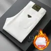 Jeans Blancos de Alta Gama Estilo Europeo a Prueba de Tres Elementos para Hombre, Corte Delgado, Elásticos, Pantalones Cónicos, Versión Forrada de Felpa Otoño e Invierno 2026, Cálidos