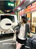 Ropa de Mujer Shenzhen Nanyou: Suéter de Punto Trenzado Falso Dos Piezas con Cuello de Camisa para Mujer, Estilo Universitario de Principios de Otoño, Largo Corto, Top de Manga Larga con Retazos