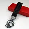 Colgante de Llavero de Cuero Gamuzado de Gama Alta para Coche Llavero con Logo de Coche Decoración de Llavero Colgante de Cintura de Metal Venta al por Mayor