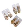 Aretes nuevos de cerámica suave geométrica con lámina de oro, moda de alto sentido del diseño, aretes para mujer, fabricantes de aretes al por mayor