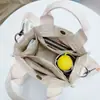 Bolsa de Lona Hombro Cruzada Portátil Estilo Coreano Artística Pequeña Fresca Moderna Versátil Bolsa para el Almuerzo Viajero Nuevo Estilo Cabello