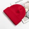 Venta al por mayor del fabricante Gorro cálido de moda para otoño e invierno, Gorro de punto a prueba de frío, Color sólido para exteriores, Protección para las orejas, Gorro de lana, Logotipo bordado