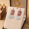 12 aretes de punto de diamante de 1 color en forma de flor, hoja larga, redondos de aleación, aretes de estilo nacional, suministro directo, venta al por mayor