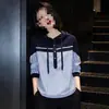 Camisa con capucha a rayas hecha a medida para mujer, nueva colección otoño 2026, con un diseño juvenil y un efecto adelgazante, perfecta como capa base