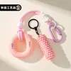 Hobby Alivio del Estrés Agarre Rodante Fortalecedor de Dedos Anillo Llavero Colgante para Bolsa Creativo Fitness Deportes Colgante Pequeño Regalo Mayoreo
