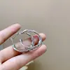 Pendientes de Aro Retorcido de Metal Aguja de Plata Moda Europea y Americana Versátiles Pendientes Elegantes de Gama Alta de Nicho para Mujer