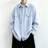 Camisa listrada azul de manga comprida para homens, camisa de trabalho estilo universitário de outono, jaqueta casual versátil de marca nova e da moda 2026