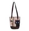 Bolso de hombro de gran capacidad con dibujos animados para mujer, lindo bolso tipo cubo de gatito, moderno y único, bolso de mano de moda para el día a día, venta al por mayor