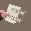 Pinza para el pelo de flecos de alta gama estilo Ins, pinza de pico de pato, moderna y simple, elegante diseño de mariposa y flor, pinza lateral de aleación de plata