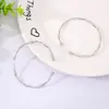 Pulseira Aberta Simples Versátil Estilo Europeu e Americano Transfronteiriça Toque de Luxo Estilo Frio Ins Anel de Mão com Padrão de Onda da Moda