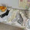 Calcetines a Rayas Songmu Songmu Etiqueta de Nombre para Mujer, Calcetines de Media Pantorrilla, Estilo Coreano Primavera y Verano Estilo Ins Algodón Holgados, Sin Costuras