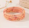 Set de pulseras de arcilla suave coloridas apilables de 6 mm elástico color Morandi bloques de color bohemio pieza metálica